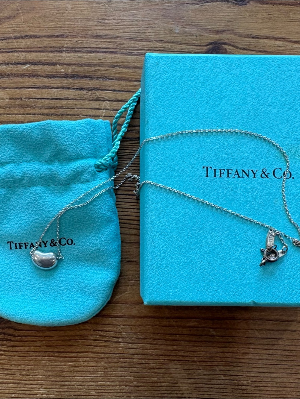 Tiffany & Co. Silver Bean Pendant Necklace with Signature Blue Box and Pouch